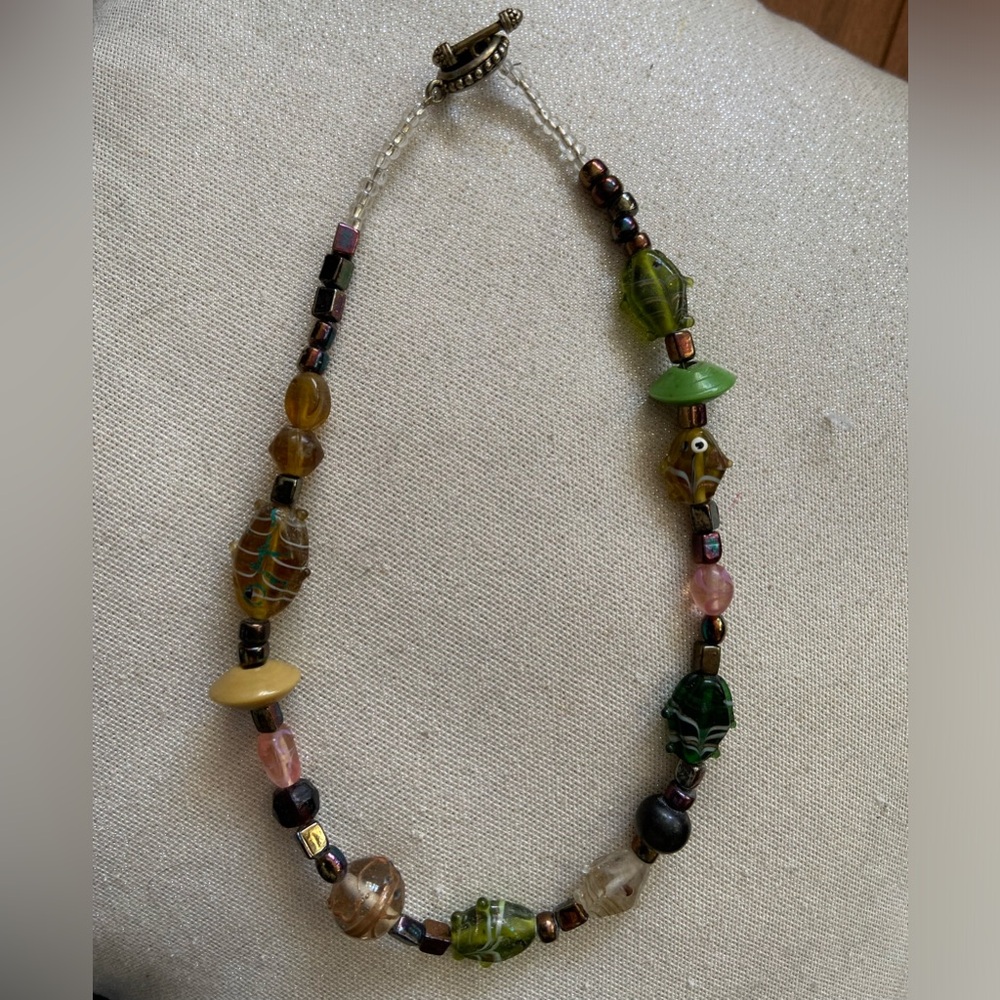 Glass Fish and Plastic Bead Necklace.  Toggle Closure.  Unisex